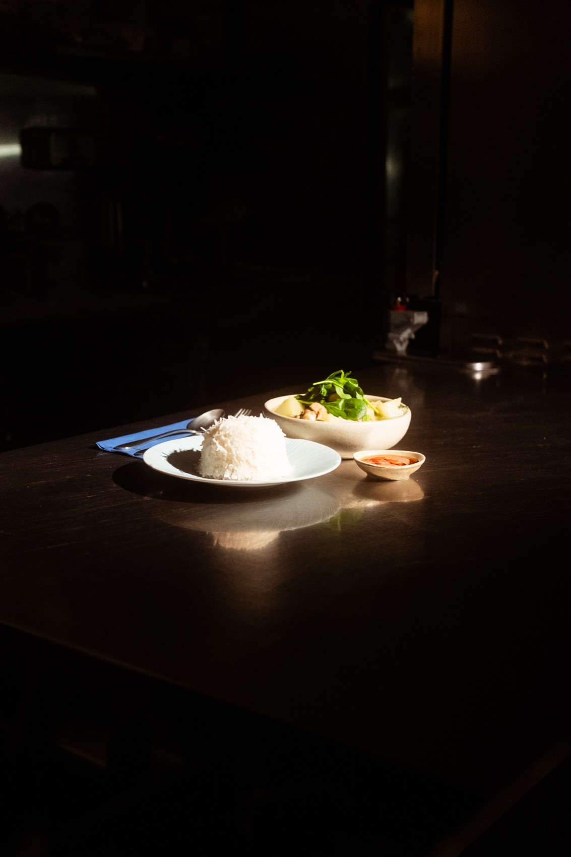 The plating scene - moody, cinematic, full of colour.